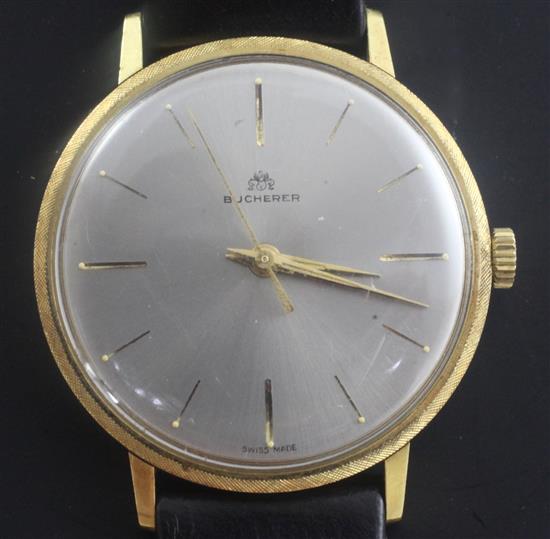 A gentlemans 18ct gold Bucherer manual wind dress wrist watch, with Bucherer box.